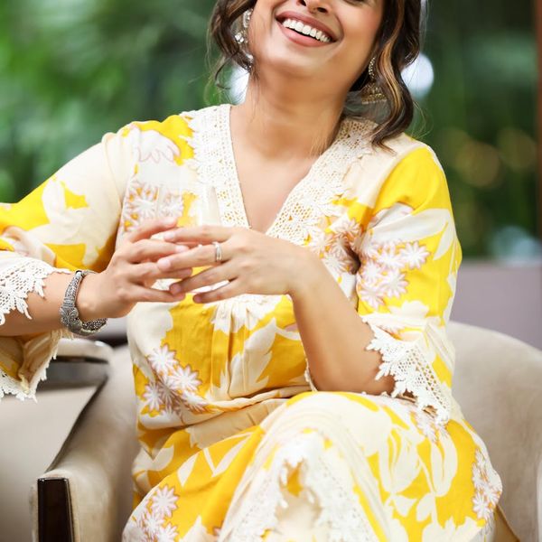 Portrait of a smiling woman feeling relaxed after a yoga session.